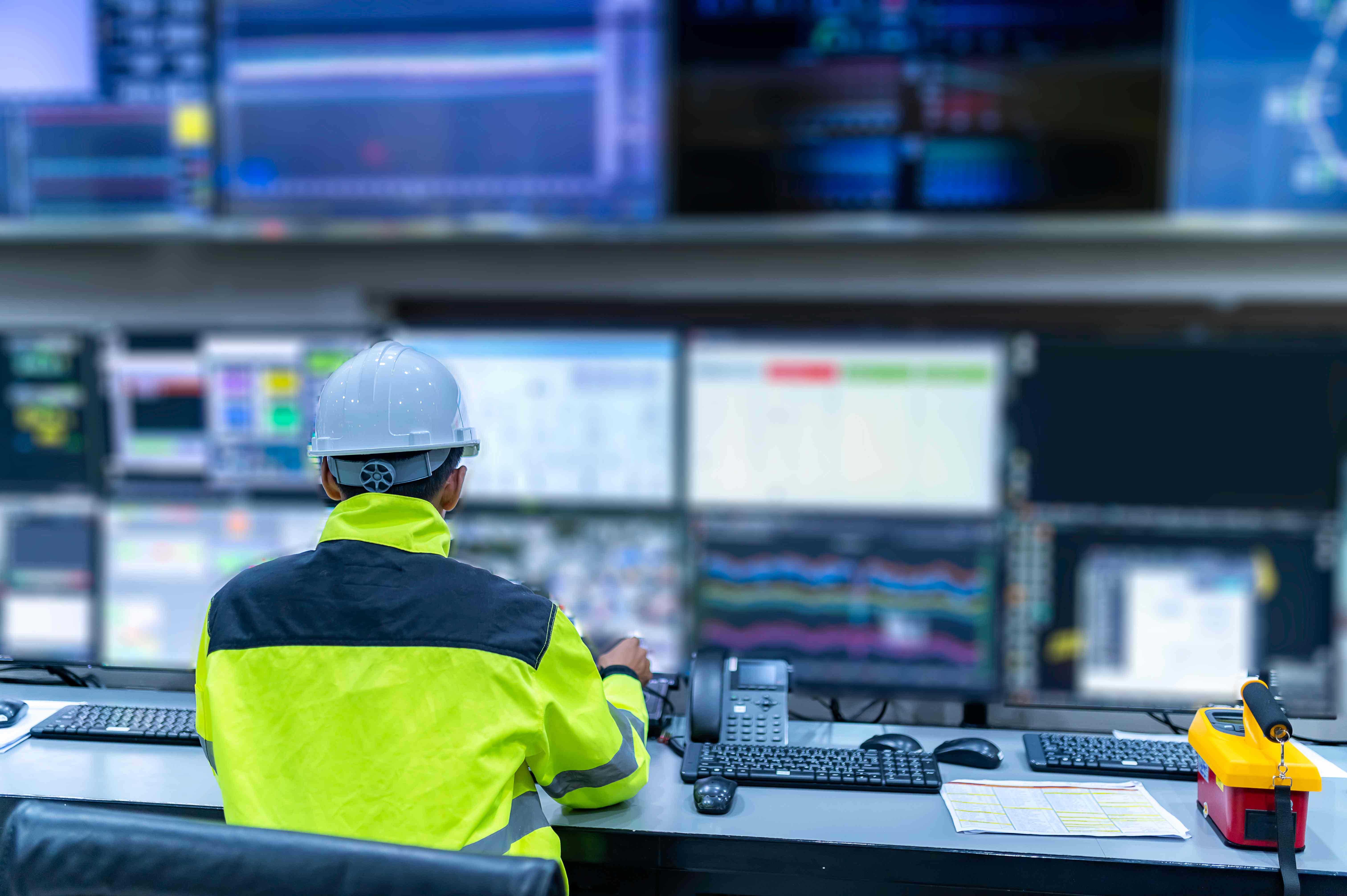 Smart safety control room with monitoring screens and early warning technology